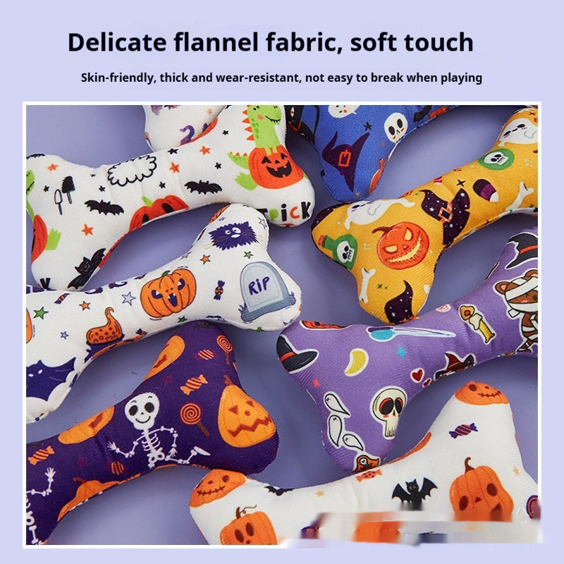 Close-up of multiple colorful Halloween plush bone toys made of flannel fabric scattered on a surface