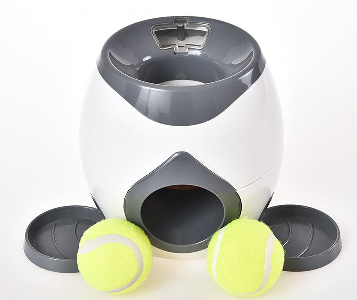 Front view of the feeder with tennis balls placed on side trays