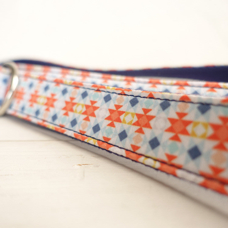 Detailed view of double-stitched patterned polyester leash material