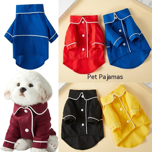Blue pet pajamas shirt with white piping on collar and cuffs