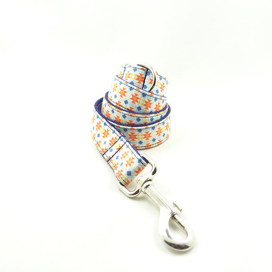 Rolled polyester dog leash with colorful geometric pattern and metal clasp