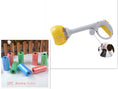 Cargar la imagen en la vista de la galería, Yellow and gray dog waste scooper with ergonomic trigger handle isolated on white
