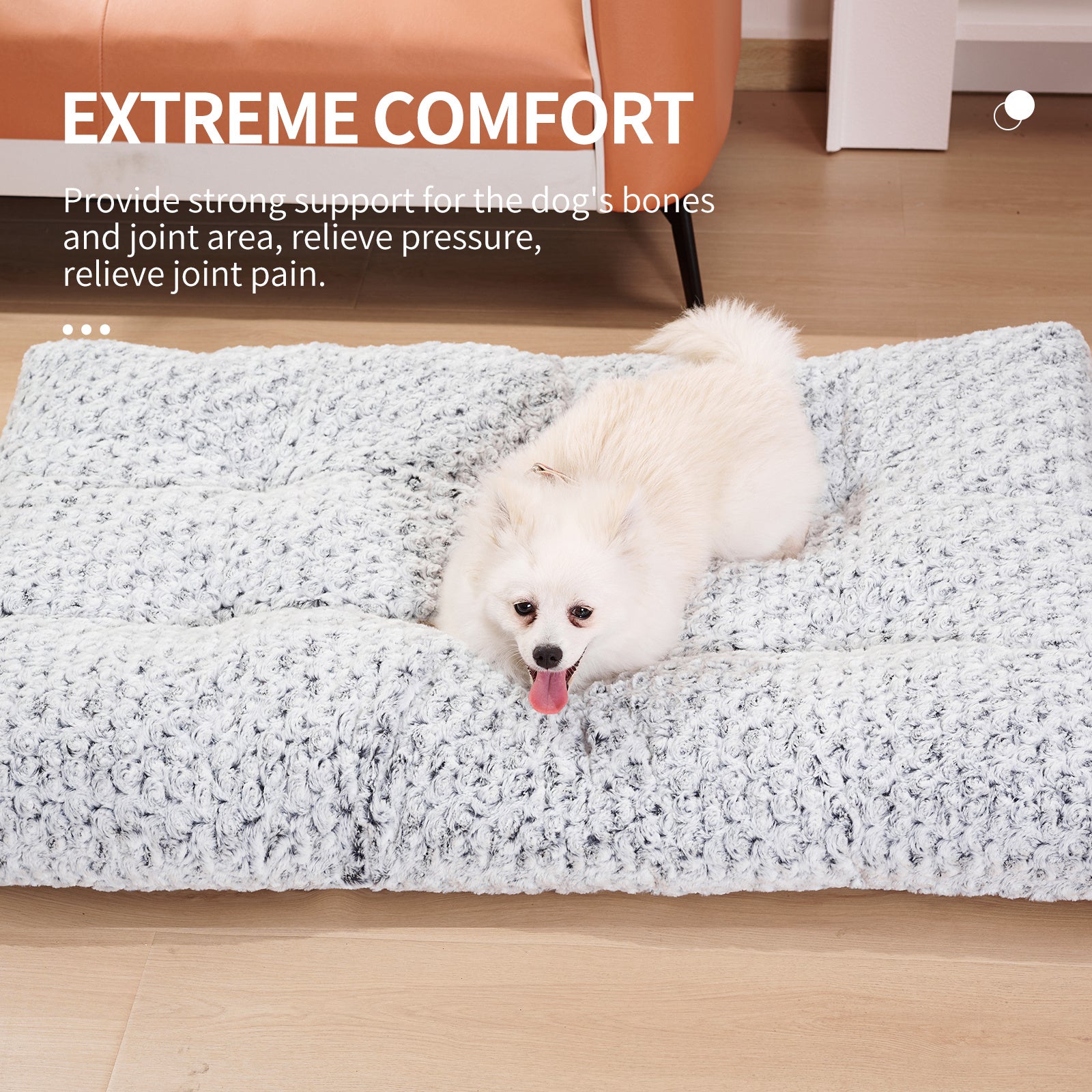 White fluffy dog lying comfortably on a textured light gray dog bed with text overlay about extreme comfort and joint support