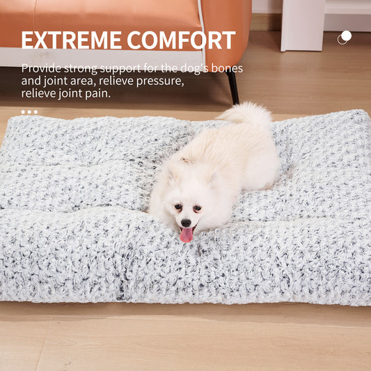 White fluffy dog lying comfortably on a textured light gray dog bed with text overlay about extreme comfort and joint support
