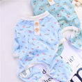 Load image into Gallery viewer, Lightweight yellow floral dog pajamas laid flat showing front button placket
