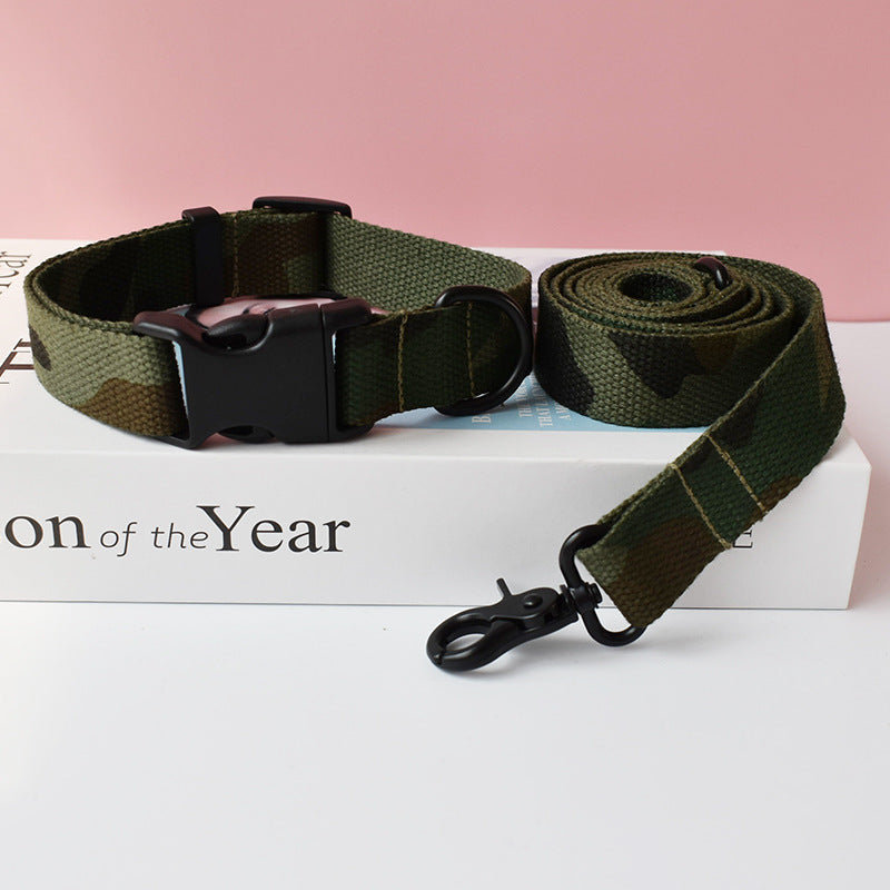 Dark green camouflage nylon dog collar and leash set with black fastening hardware on white box