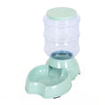 Cargar la imagen en la vista de la galería, Light green pet feeding station with transparent large water reservoir and curved food bowl base
