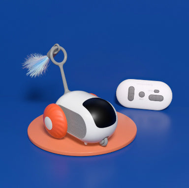 Remote control cat toy with orange wheels and feather on orange display base alongside white remote control on blue background