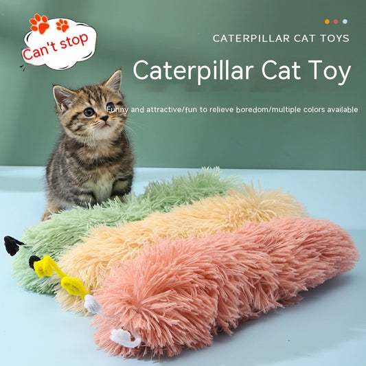 Kitten playing with colorful plush caterpillar cat toys on light blue surface