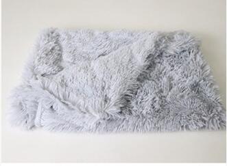 Another view of light gray plush pet blanket folded