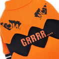 Load image into Gallery viewer, Close-up detail of orange pumpkin dog sweater showing 'MEOW' and 'GRRRR...' text graphics
