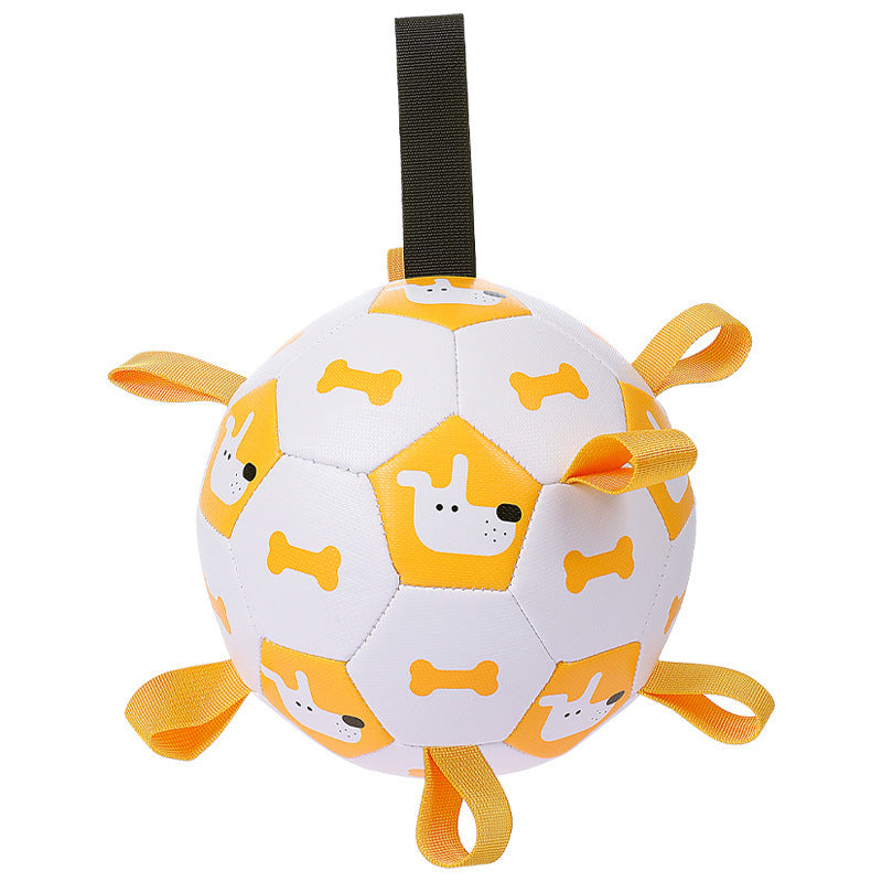 White and yellow inflatable dog toy ball with dog and bone prints and multiple orange loops