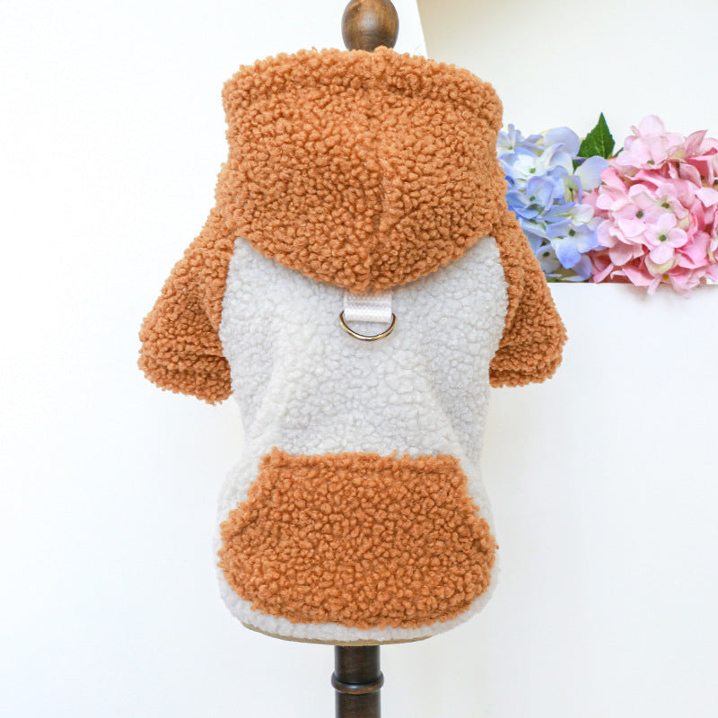 Burnt orange and white lamb fleece dog sweater on a mannequin highlighting pocket and hood