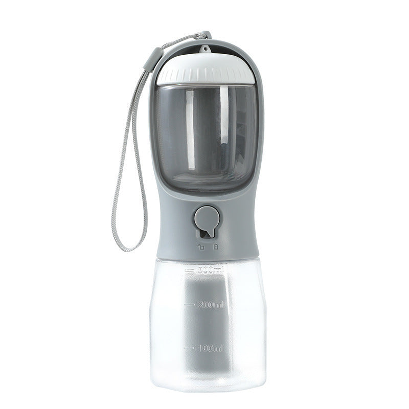 Gray 3-in-1 portable dog water bottle and food container with transparent reservoir and carrying strap