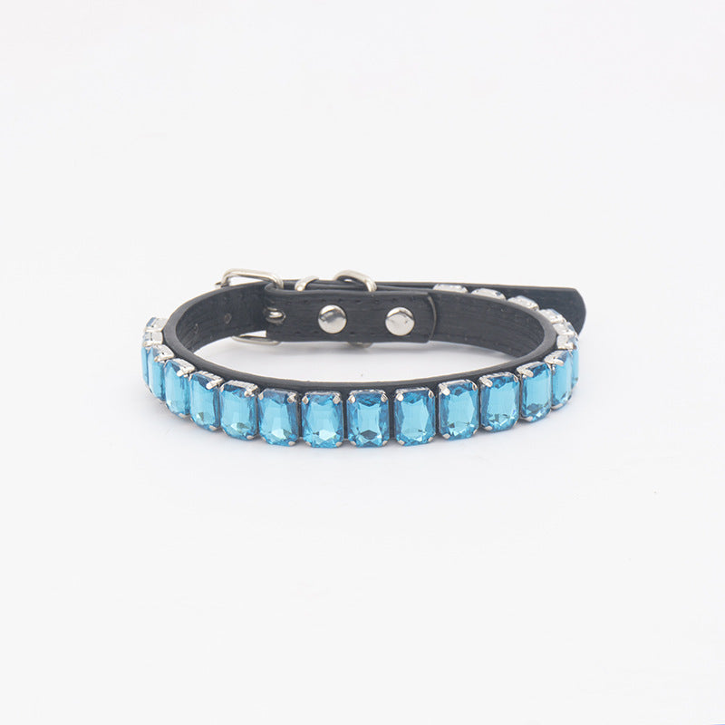 Light blue rhinestone PU pet collar laid flat on white background