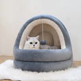 Load image into Gallery viewer, Gray plush pet cave bed with cream-colored interior lined with soft plush material, and a cat resting inside next to a hanging plush ball toy
