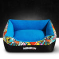 Charger l'image dans la visionneuse de la galerie, Royal blue plush pet bed featuring vibrant, colorful pattern on outer rim
