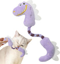 Load image into Gallery viewer, White cat playing with a purple plush dinosaur chew toy held by a person
