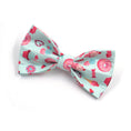 Load image into Gallery viewer, Pastel blue dog collar with attached decorative bow tie adorned with sweet treat cartoon prints
