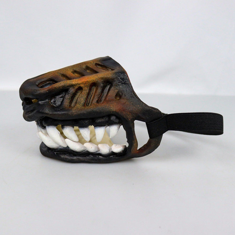 Front view of the vampire teeth dog muzzle showing detailed teeth and textured design with adjustable strap on white background