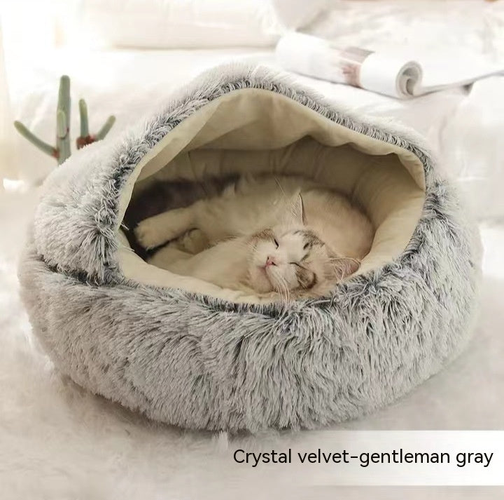 Cat comfortably sleeping inside gray crystal velvet dome pet bed