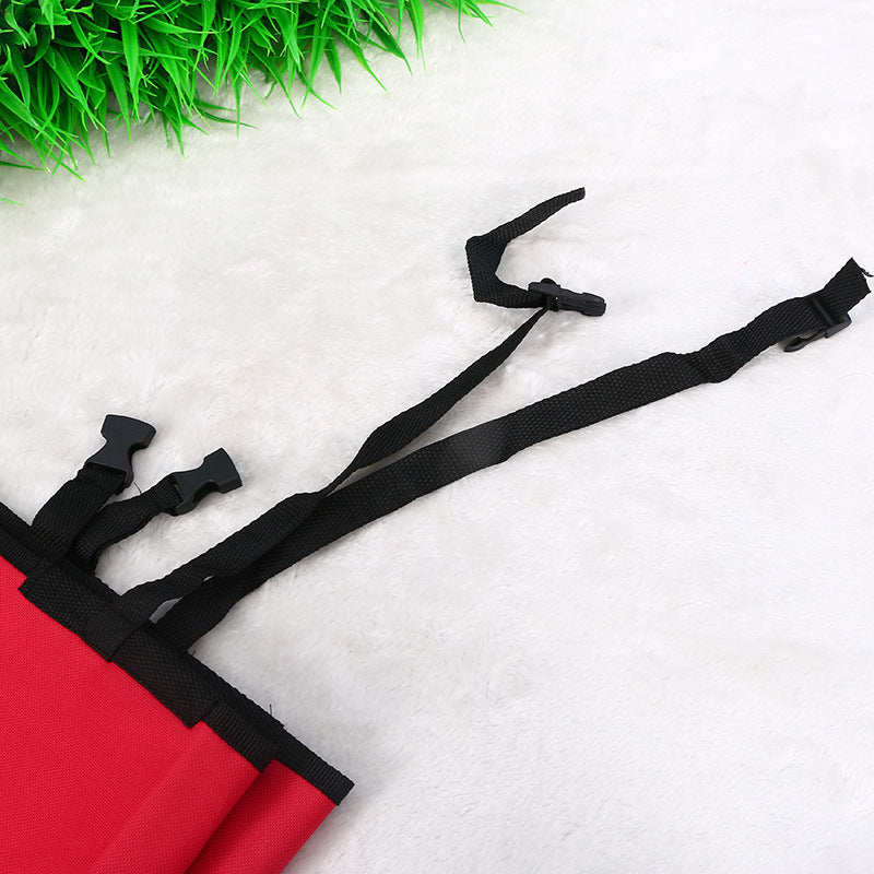 Close-up of black adjustable straps with buckles for securing pet seat cover