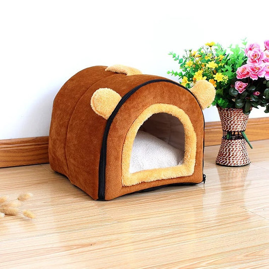 Brown suede plush pet kennel with yellow faux bear ears and cushion inside