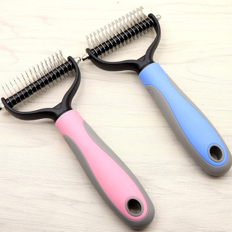 Blue and grey dog grooming comb positioned on a light wooden background