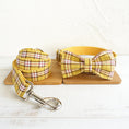 Load image into Gallery viewer, Plaid bowknot dog collar paired with matching leash displayed side by side
