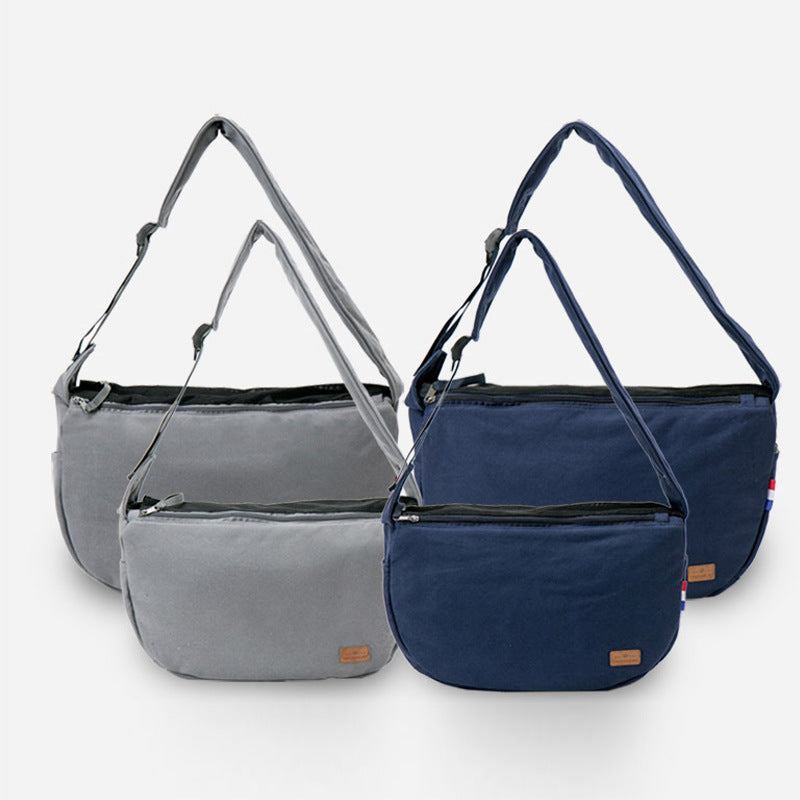 Two sizes of pet travel shoulder bags in gray and navy blue colors displayed side by side