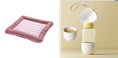 Load image into Gallery viewer, Pink cooling pet bed mat displayed near beige and white pet feeder with heart decorations on lid.

