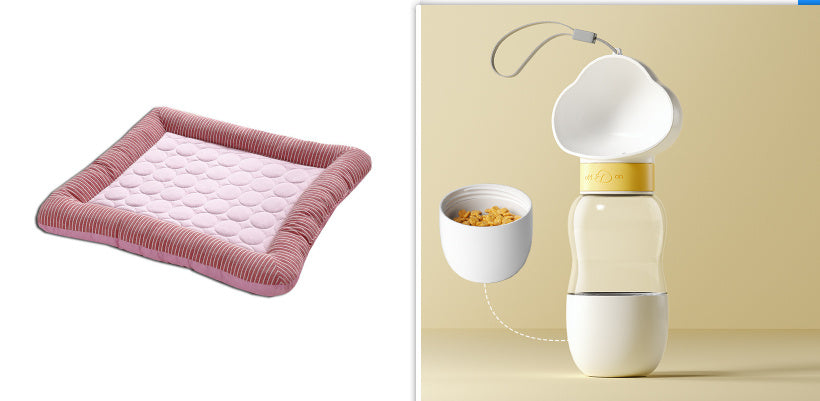 Pink cooling pet bed mat displayed near beige and white pet feeder with heart decorations on lid.