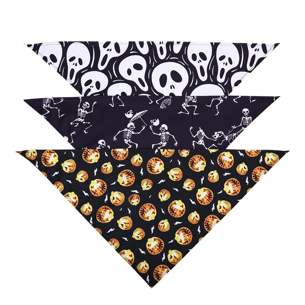 Triple display of triangular dog bandanas with spooky ghost, skeleton, and pumpkin prints