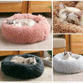 Load image into Gallery viewer, Multiple cats lying in various colored plush pet beds including pink, gray, and light gray in cozy home setting
