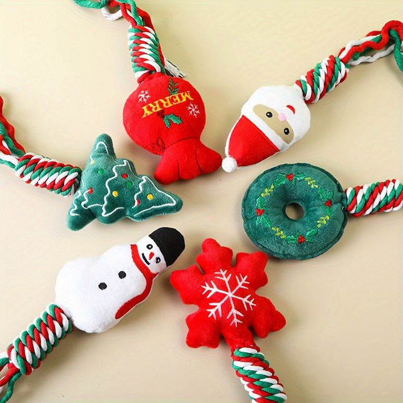 Overhead view of the full set of six toys with Santa, snowman, tree, wreath, snowflake and red sack plush tops
