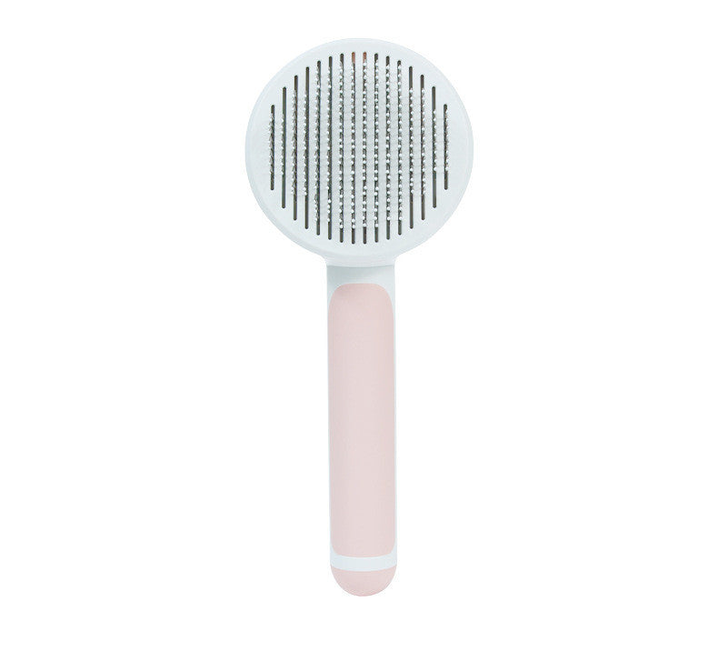 Pink handle pet hair comb with rounded handle and stainless steel needles