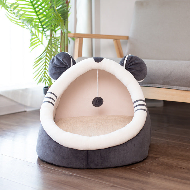Dark gray plush pet house with white trim and ears, empty inside