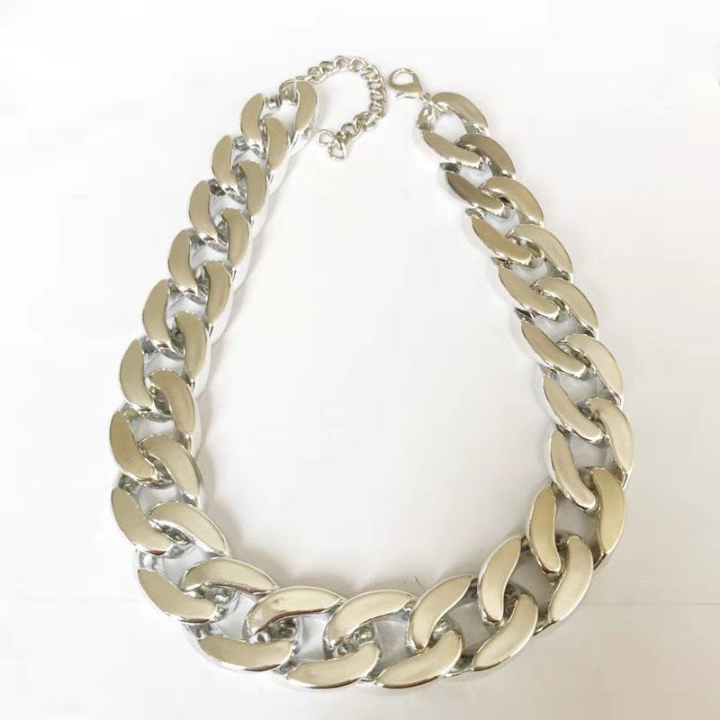 Big silver plastic chain necklace with adjustable clasp laying flat