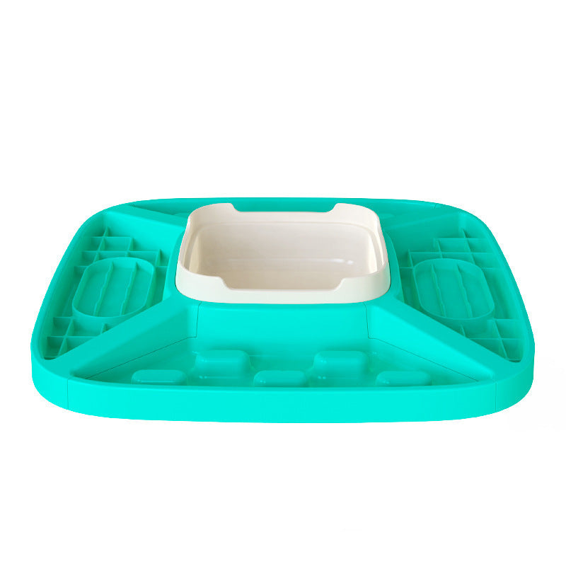 Side view of the teal and white multifunctional dog feeder showing slow feeder sections and central water bowl