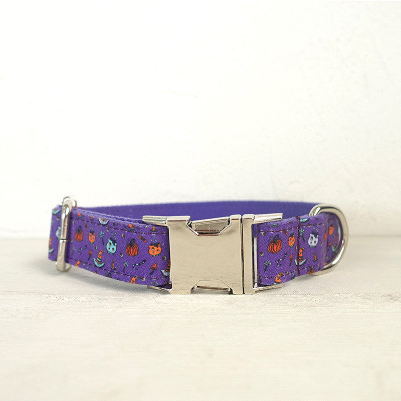 Front-facing view of purple Halloween dog collar fully fastened showcasing vibrant Halloween print and shiny metal buckle