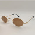 Charger l'image dans la visionneuse de la galerie, Brown oval dog sunglasses toy on white background with black ear tips
