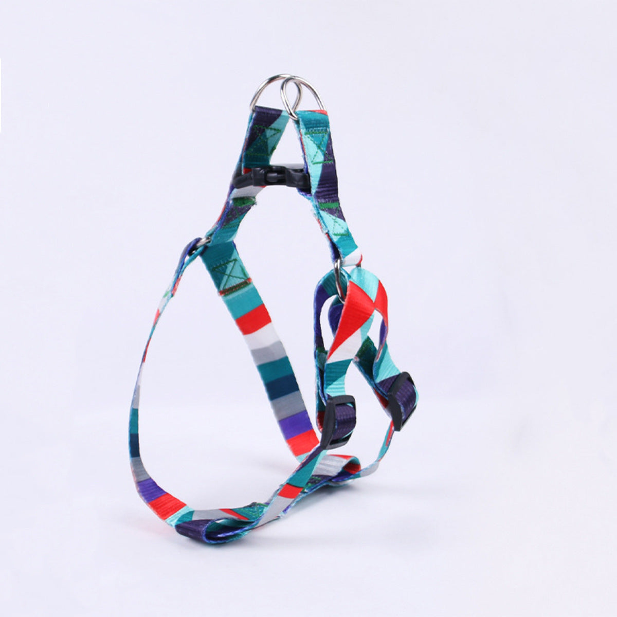 Close-up of metal clasp and handle end of blue and red geometric patterned dog leash