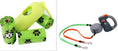 Load image into Gallery viewer, Green dispenser holding multiple rolls of paw print dog waste bags next to dual retractable dog leash with orange and green straps
