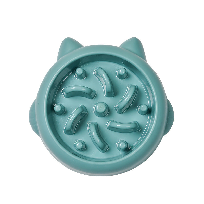 Top view of green slow feeder bowl featuring bone and knob pattern