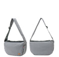 Load image into Gallery viewer, Side and front views of gray pet travel shoulder bag with padded shoulder strap and zip closure
