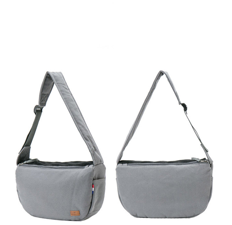 Side and front views of gray pet travel shoulder bag with padded shoulder strap and zip closure