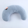 Load image into Gallery viewer, Light blue U-shaped plush pet pillow with pink flower embroidery on white background
