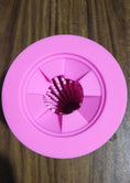 Load image into Gallery viewer, Top view of pink silicone dog paw washer showing bristles and opening design

