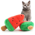 Load image into Gallery viewer, Plush toy shaped like a watermelon popsicle with red and green colors beside a gray cat

