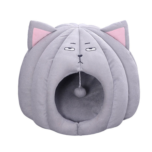 Gray plush enclosed cat bed shaped like a cat head with pink ears and sleepy embroidered eyes
